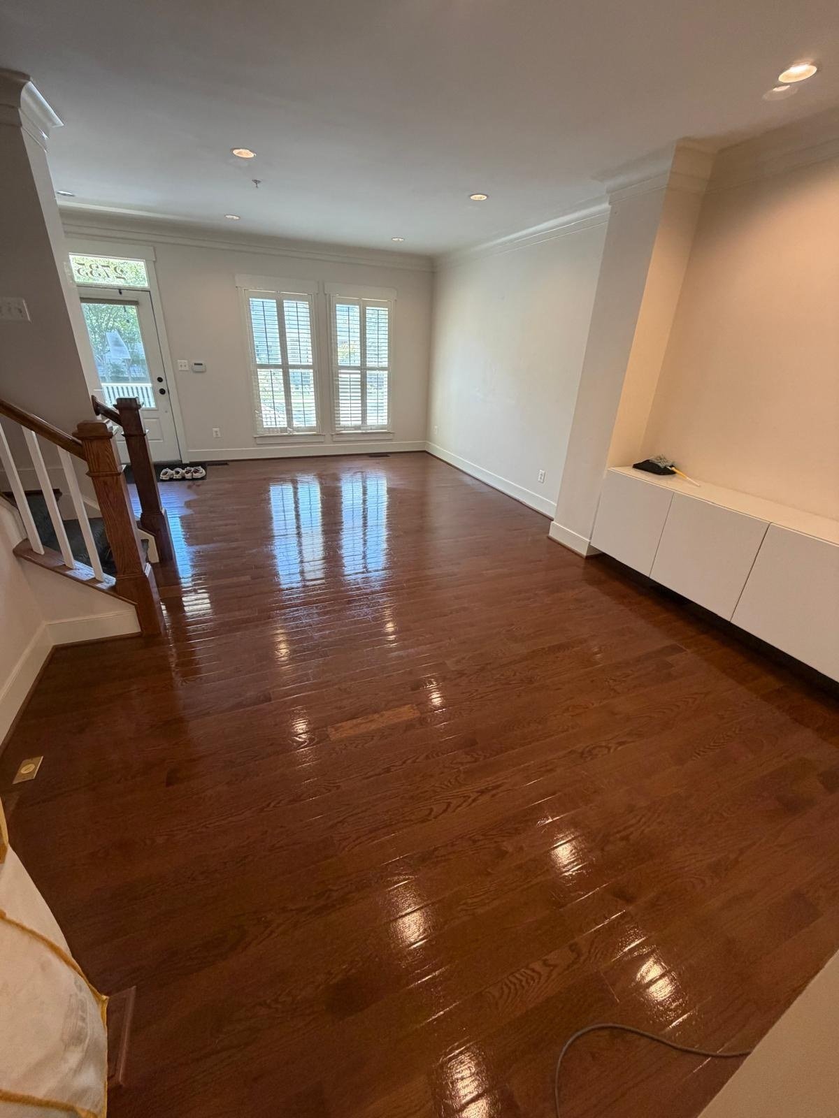 Freshly cleaned interior with polished hardwood floors